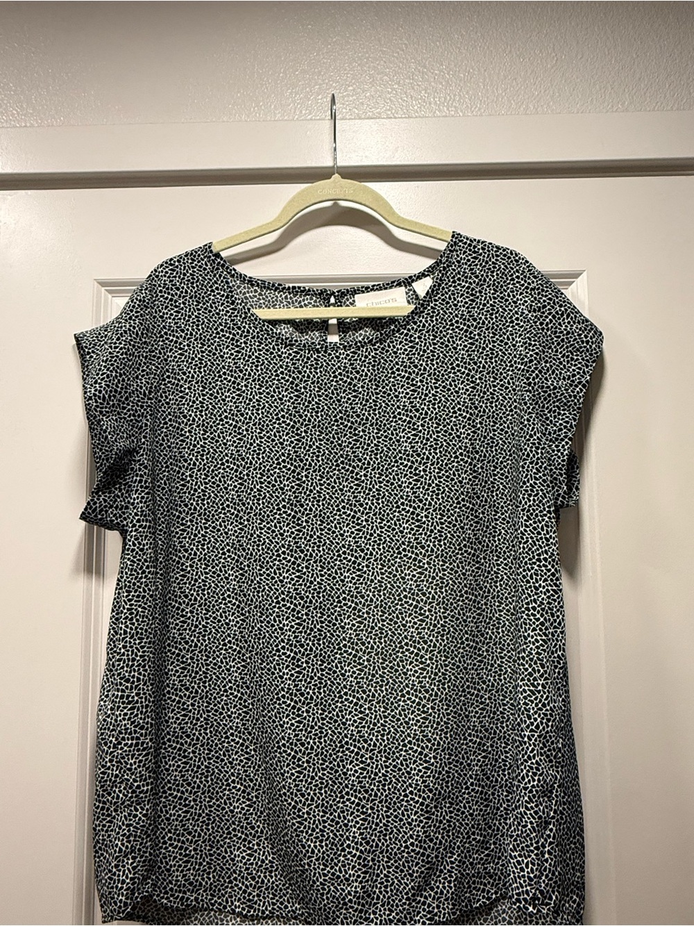 Chico’s black and white animal print Short Sleeve Blouse